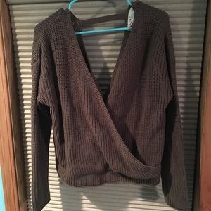 Olive green sweater, crosses in front and back!